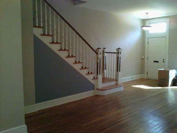 High ceilings, open staircase.