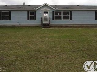 10338 Maple Hill Rd, Howard City, MI 49329