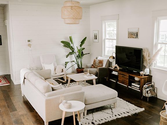 Large living area with hardwoods throughout.