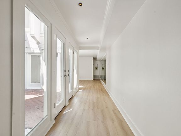 Hallway + Atrium from Entry