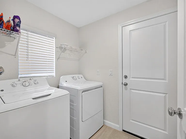 5876 NW Sweetwood Dr — Photo 7