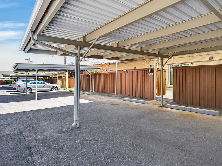 2 carport spaces (+ one extra space shared with unit next door)