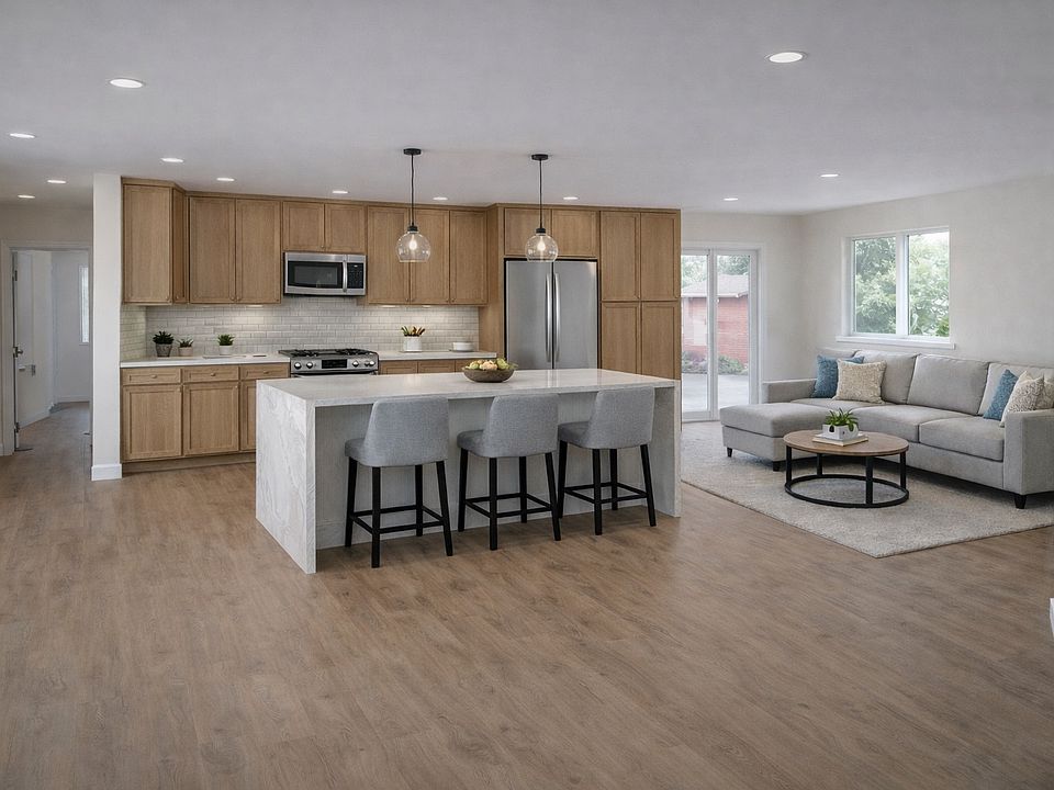 AI rendering of kitchen & living room space. Full photos coming later this week once remodel is complete!