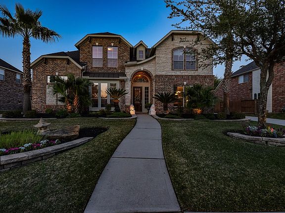 Gorgeous Trendmaker home with stacked stone elevation.