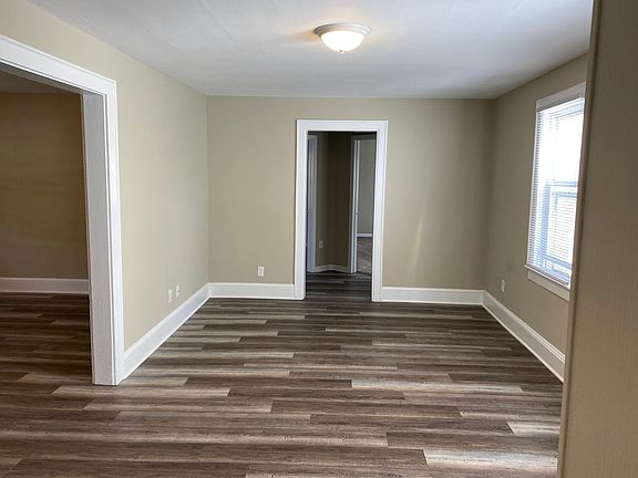 Den/dining room. Dimensions: 18' x 11 1/2'.