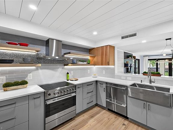 3rd image of 6080 PELICAN BAY BLVD #205A