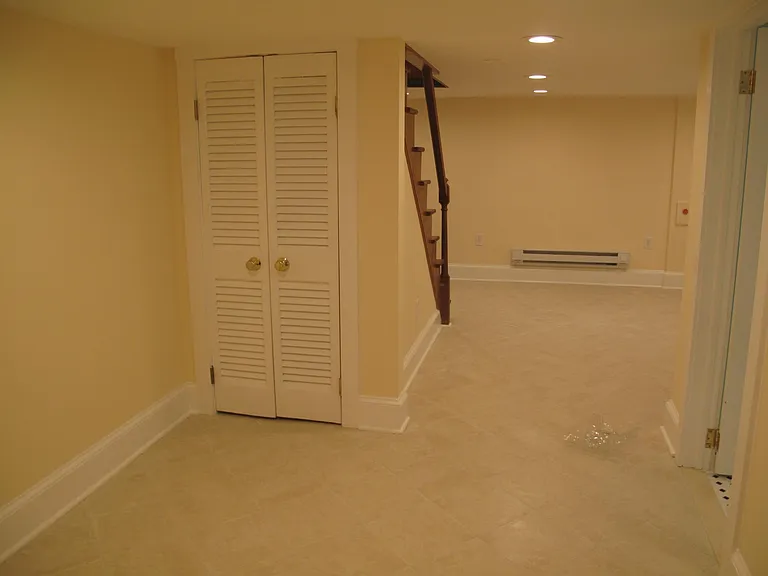 lower level tiled area...used for bedroom or rec area