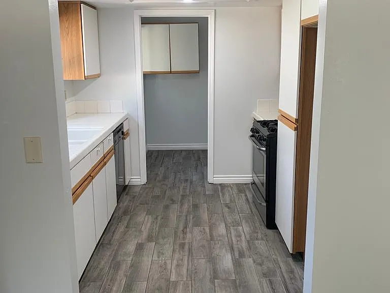 Kitchen, laundry in back