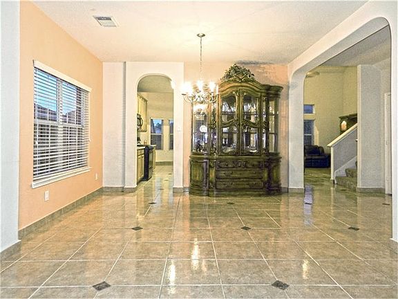 Another view of the dining room area and the nice tile flooring