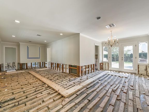 Living Room and Dining Room flow seamlessly and offer access to the outdoor patio.