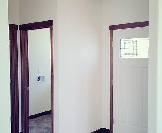 front entry with Laundry room. Main floor