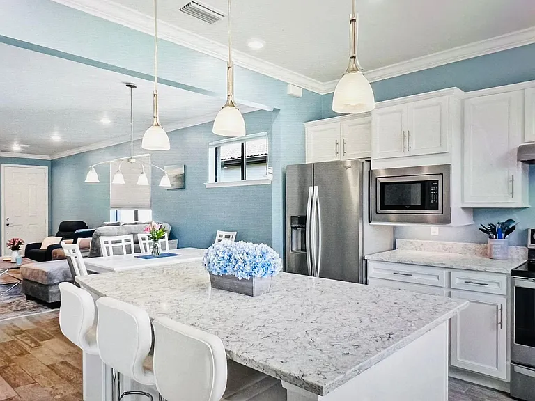 Gorgeous kitchen with under dimmable lighting on all lights