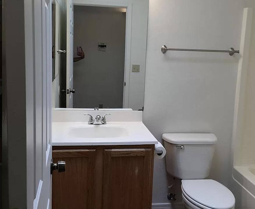 The hall bathroom is a full bathroom with a bathtub.