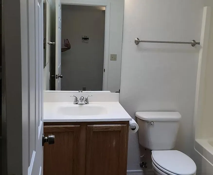 The hall bathroom is a full bathroom with a bathtub.
