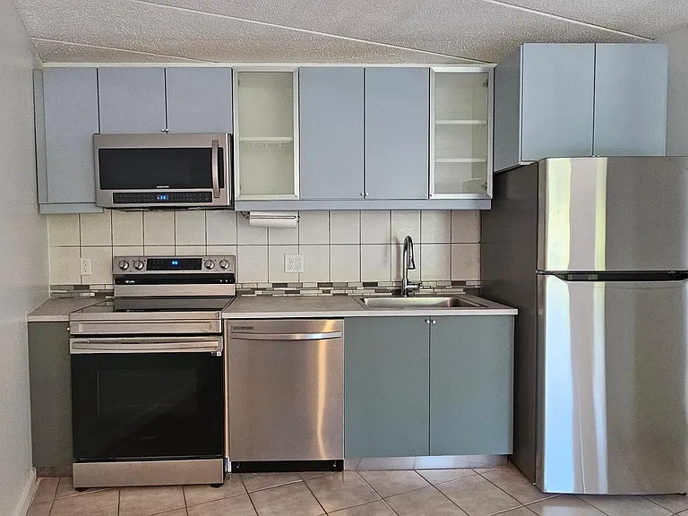Remodeled kitchen with new stainless steel appliances