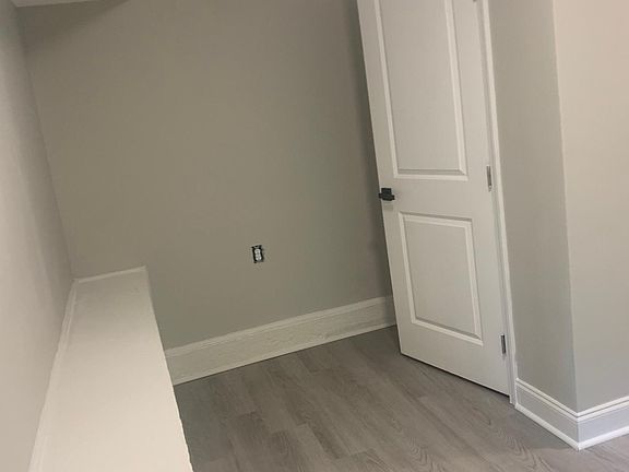 One side of the bedroom (fits a queen/full size bed)