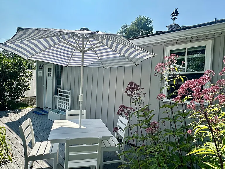 Enjoy cooking on the outdoor propane grill and dining outside on the new composite deck!