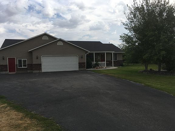 Two car garage.  Paved Drive