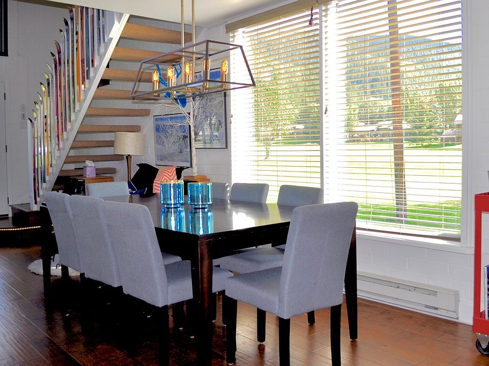 Dining table seats 8 plus 3 at bar.