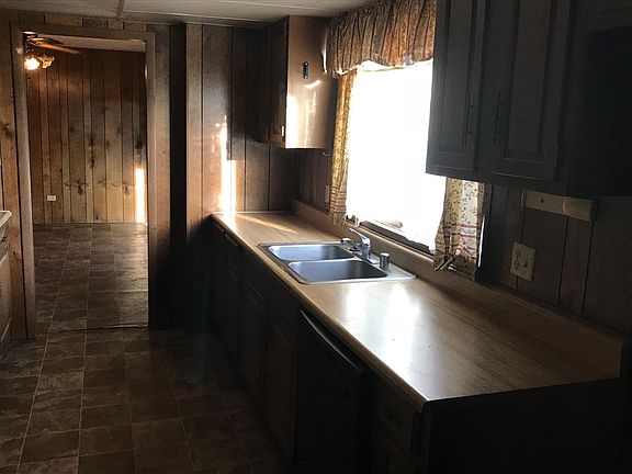 Kitchen w dishwasher, built in oven, cooktop and refrigerato