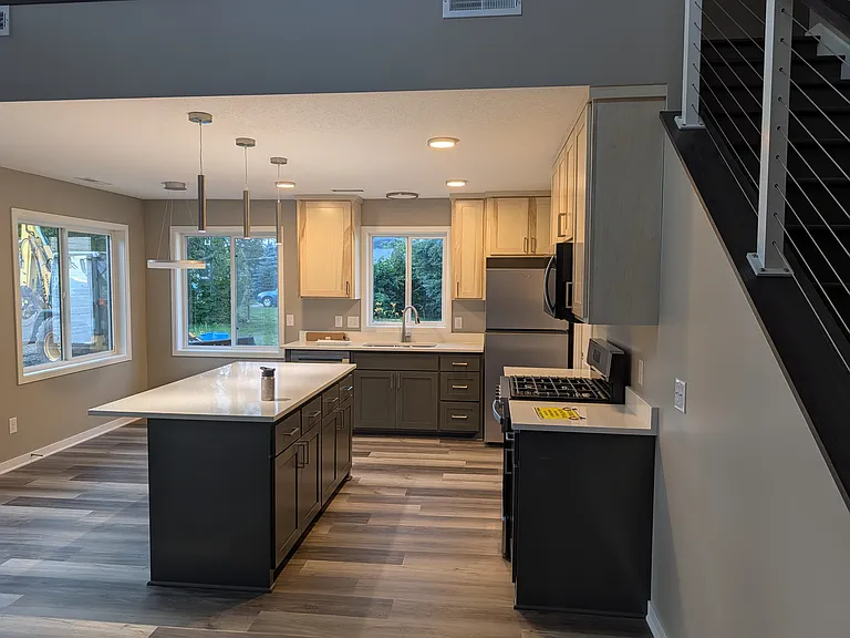 Gas stove and custom cabinets. All new Whirlpool appliances.