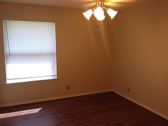 bedrooms have vinyl wood with mini blinds.