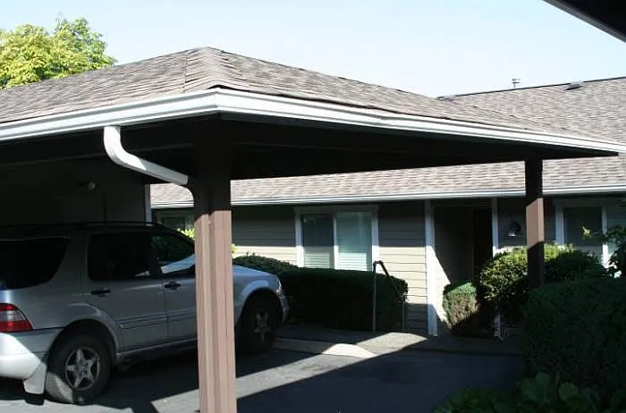 2 car parking is covered and steps from door.
