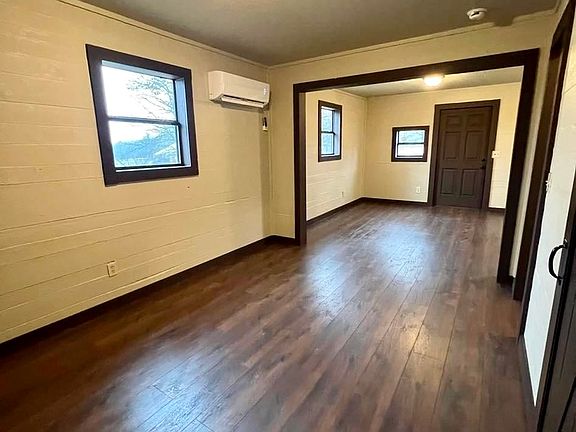 View from bedroom looking to living/kitchen area