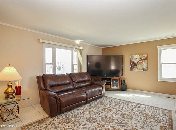 Beautiful tiles throughout the living room.