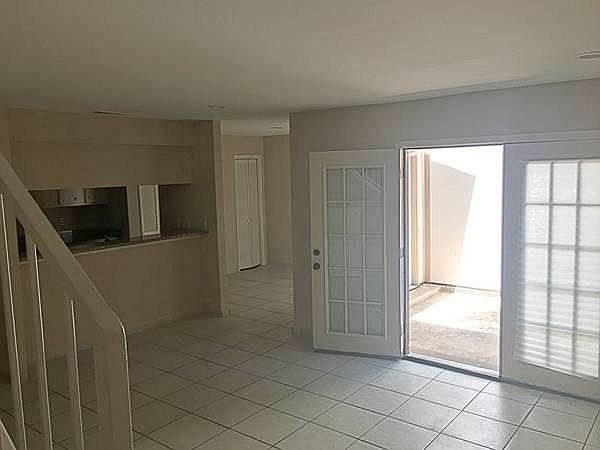 Living room and view of breakfast area