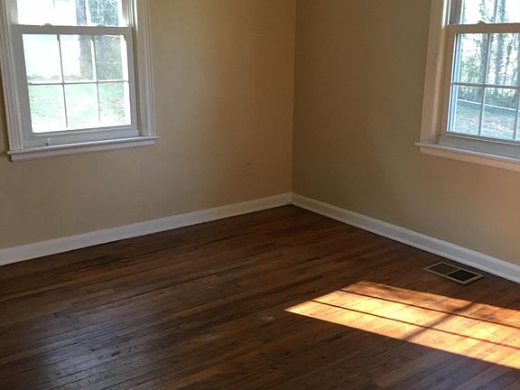 Bright bedroom, overlooking yard and woods