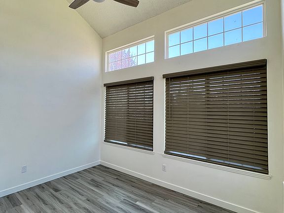 2nd bedroom or office area with closed blinds