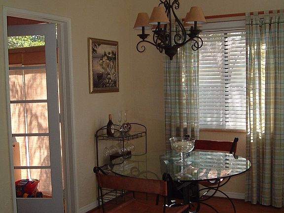 Dining room leading to Den