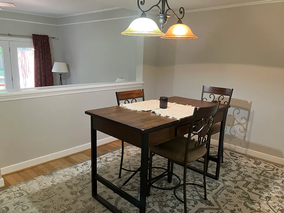 Dedicated kitchen has table with leaf