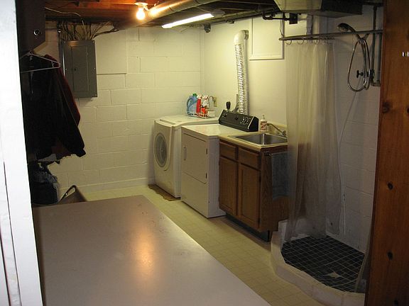 large laundry room with shower