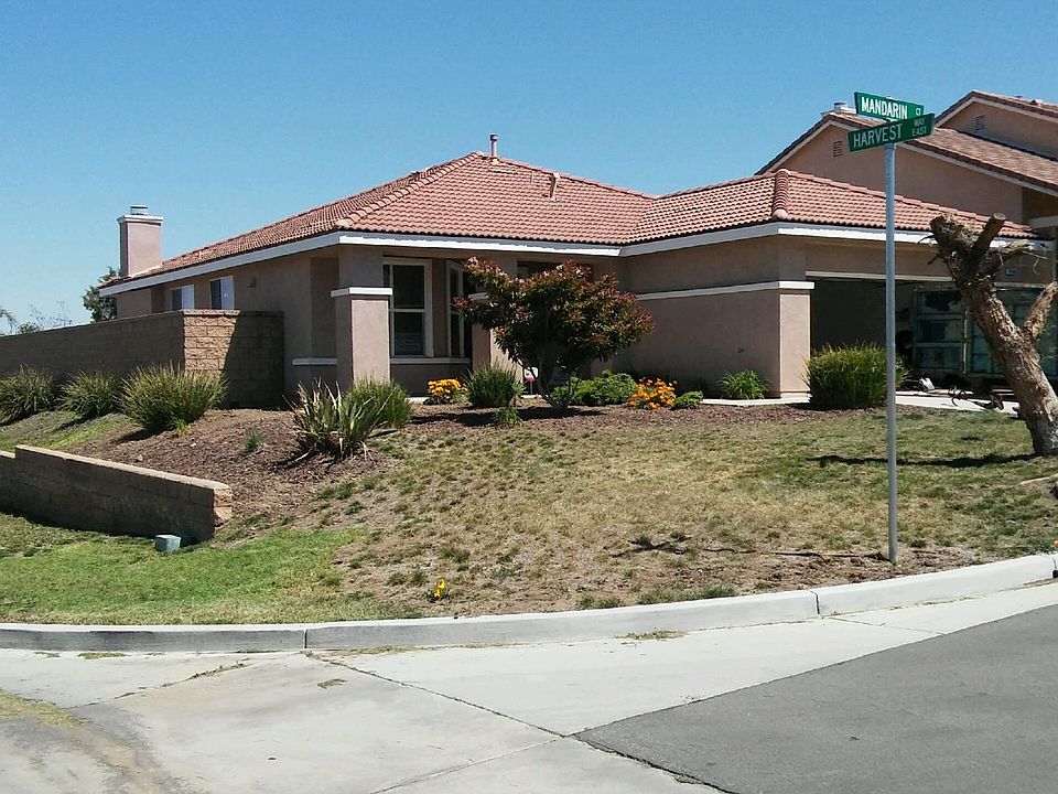 Remote controlled garage door _drive into garage and enter house from the safety and security of the garage without leaving car __.