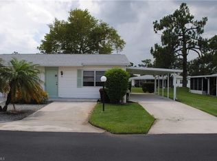 12 Dawn Flower Cir, Lehigh Acres, FL 33936