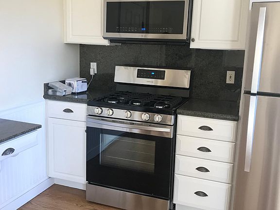 Gas stove and built in microwave.