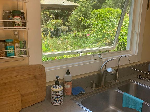 kitchen window looks out to private garden
