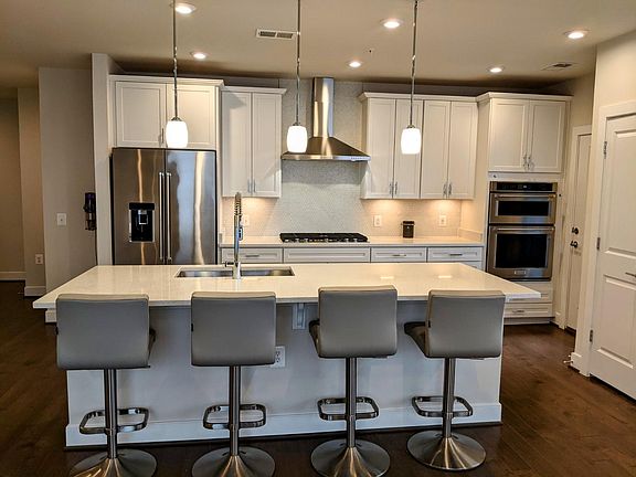 Kitchen with 360 Degree Swivel Bar Stools