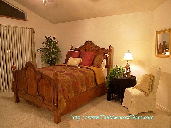 Elegant bedroom with slider to the backyard