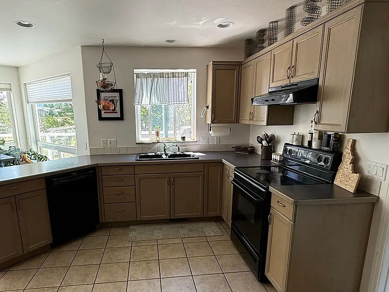 Kitchen with view to outdoor deck/grill area