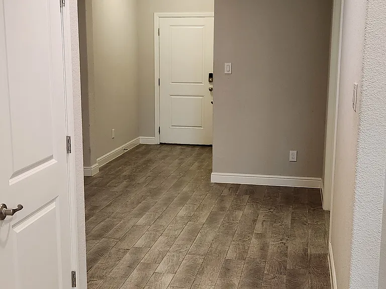 plenty of room in the entry foyer - 3 bedrooms toward the front of the home, master all the way in the back -very private split floor plan