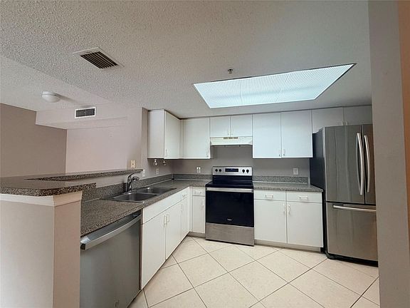 2nd image of 5025 Wiles Rd APT 101