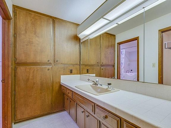 Master Bathroom - Lots of storage and a walk in therapy tub.
