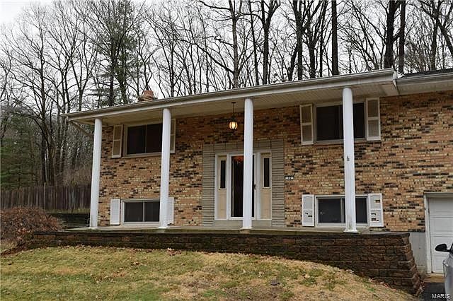 Welcome to 12 Rainbow Trail, 63010. Brick front, vinyl sides/back. Property offered AS IS.