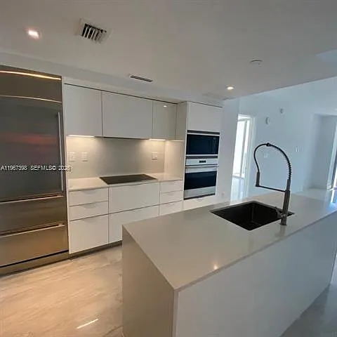 9521 E Bay Harbor Dr — Photo 4