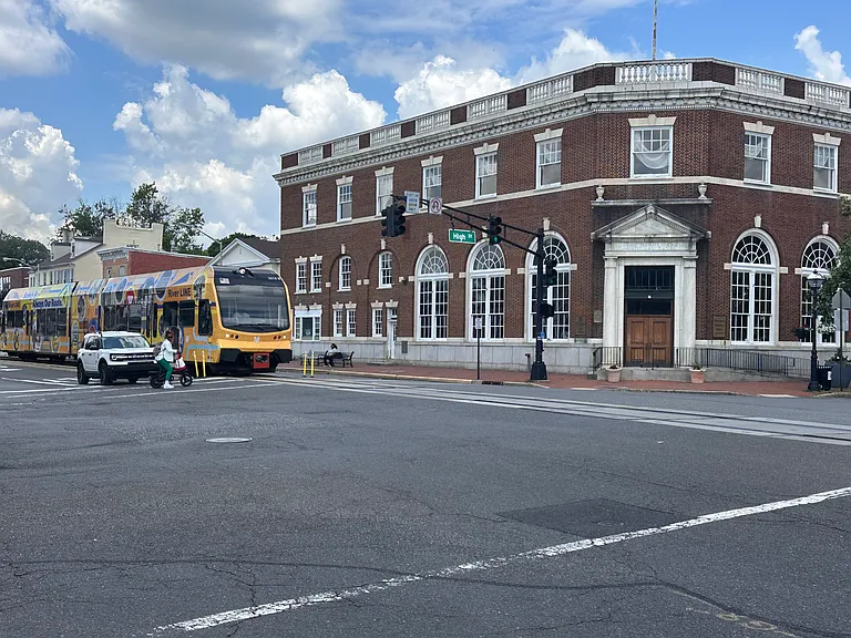 Situated across from a landmark historic bank building.