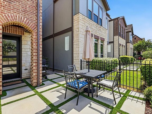 Front courtyard. outdoor table, chairs and grill stay with property.