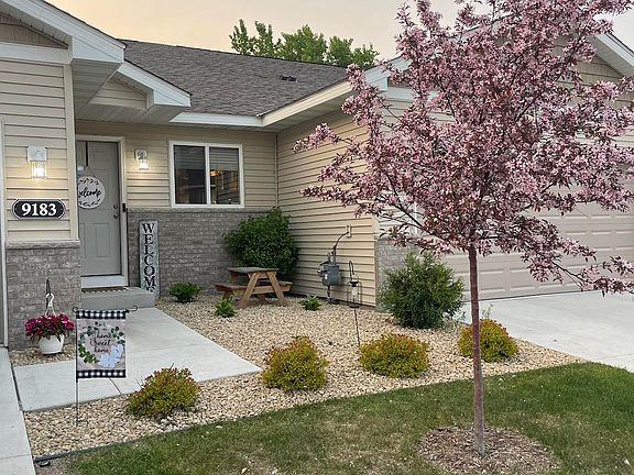Nice landscaping and walk way to your home!